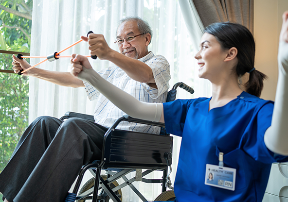 A senior Asian man doing cardiac rehabilitation with his therapist